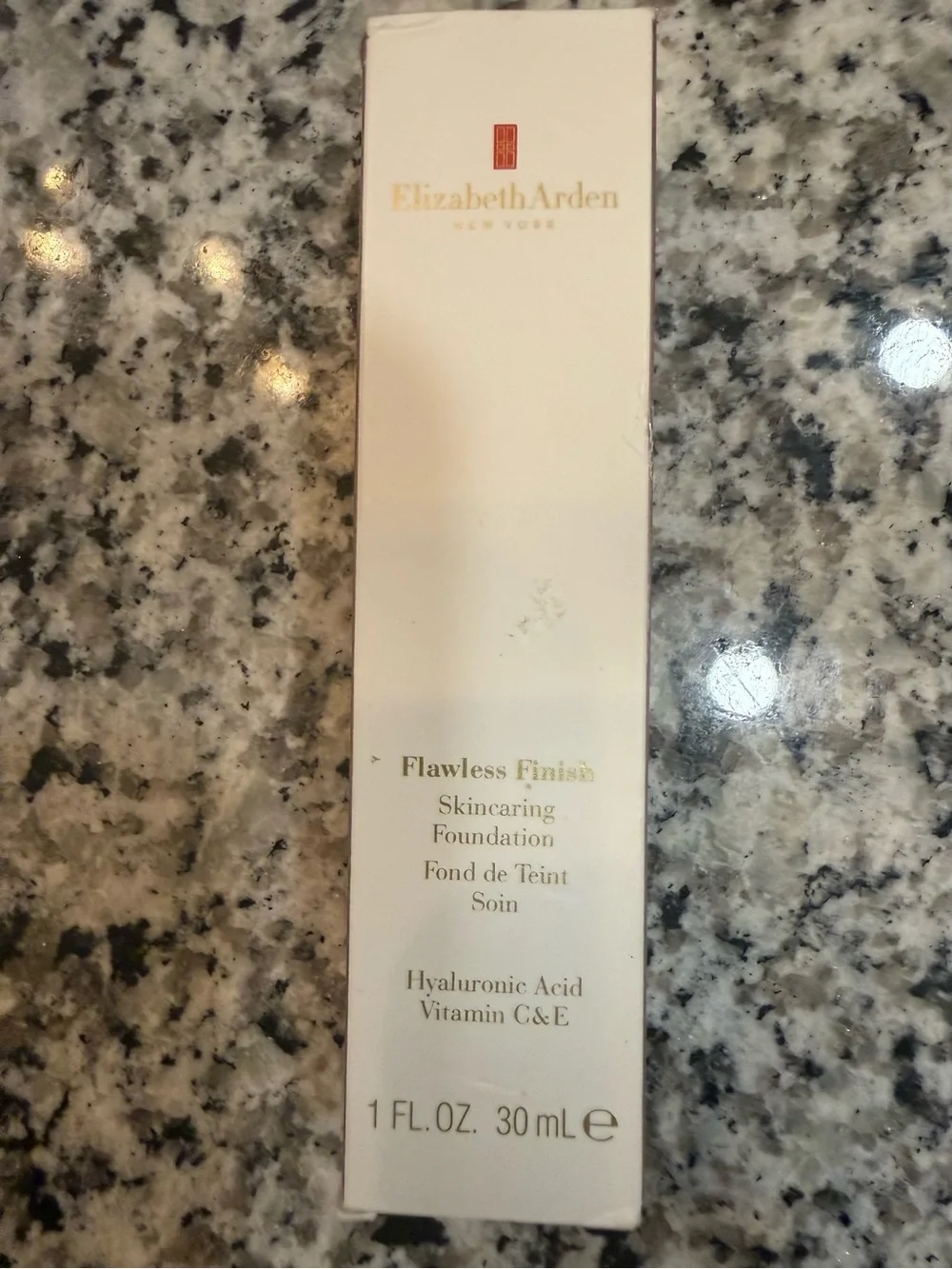 Elizabeth Arden Flawless Finish Skincaring Foundation - Black & White Text Label
